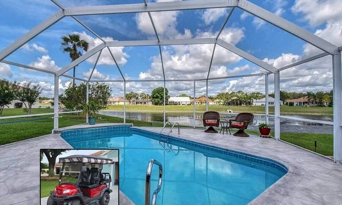 The Villages House | Waterfront, Heated Pool, Golf Cart, & 2 King Beds
