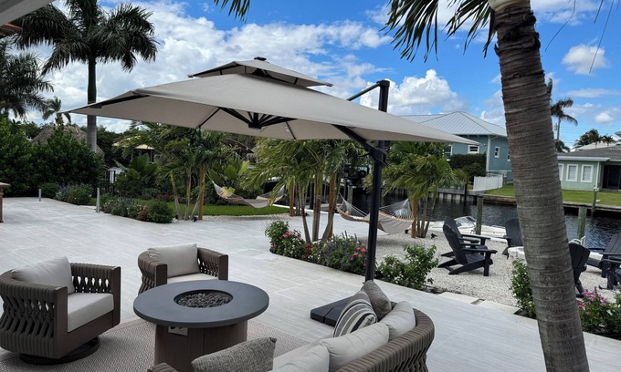 Palm City House | WATERFRONT HOME WITH 60 FOOT DOCK AND RESORT STYLE BACKYARD