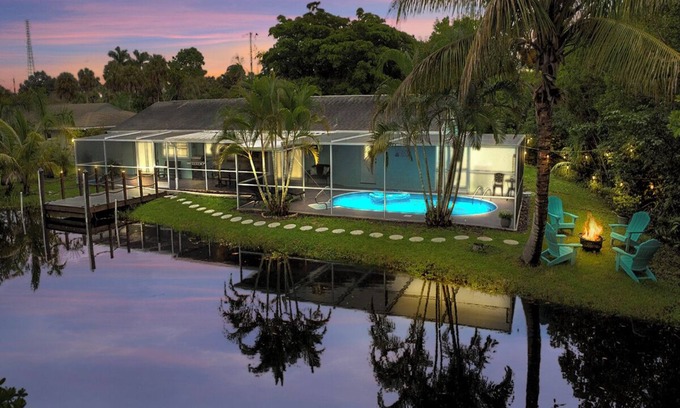 Fort Myers House | Waterfront Oasis: Heated Pool, Kayaks, Fishing, BBQ & Game Room
