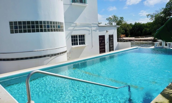 Belize City Apartment | Waterside Sea View 2-BR Apt for 6 w Balcony & Pool