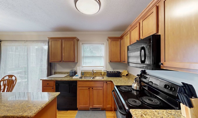 Mills River House | Well-located home in town with sunrise views, deck & great backyard