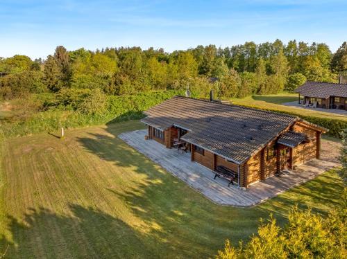 Fjerritslev House | Well-Maintained Log House With Hot Tub, Sauna And Covered Terrace In Thy