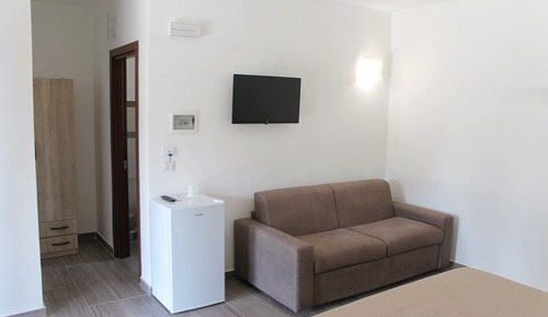 Comfort Quadruple Room, Patio, Garden View