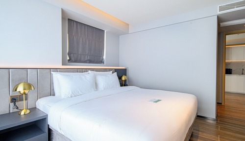 Two-Bedroom Deluxe Suite with Sea View