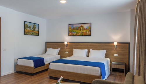 Deluxe Triple Room