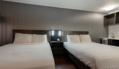 Deluxe Room, 2 Queen Beds, Non Smoking, Refrigerator & Microwave