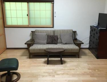 Deluxe Family Room with Shared Bathroom