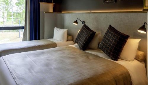 Standard Room with One Double Bed and Three Single Beds