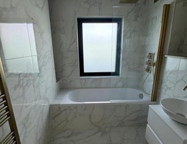 Three-Bedroom Premium Apartment with Balcony