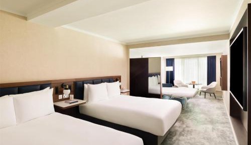 Premium Room with Two Queen Beds and Sofa Bed