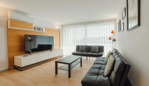 Three-Bedroom Apartment with Water View