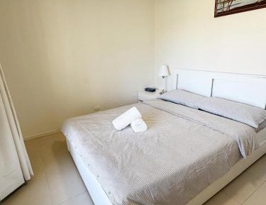 Queen Room with Shared Bathroom