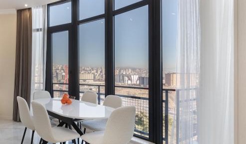 One-Bedroom Apartment with Balcony and City View