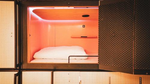 Single Bed in Dormitory Room