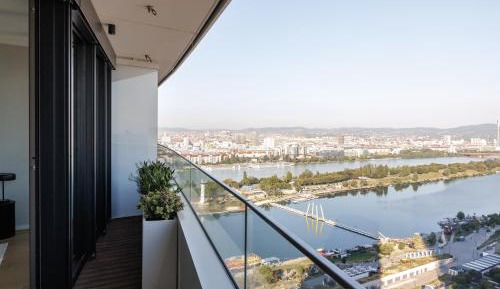 One-Bedroom Apartment with Balcony and City View