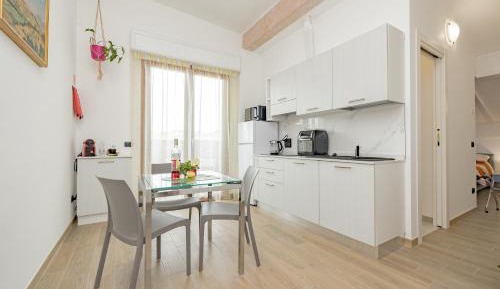 One-Bedroom Apartment with Balcony and City View