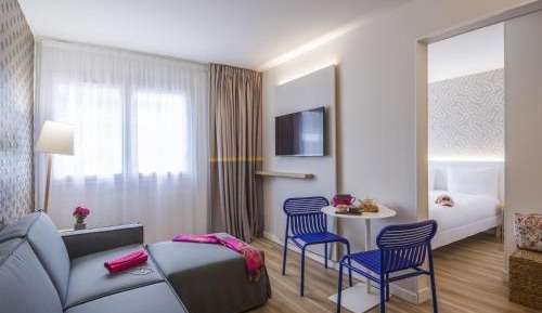 Standard Family Room with One double bed and Two sofa beds