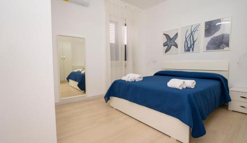 One-Bedroom Apartment with Balcony and Sea View