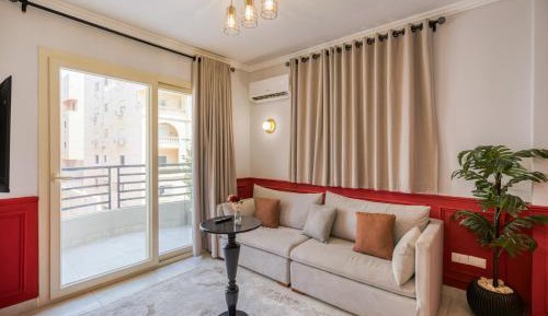 One-Bedroom Apartment with Balcony and City View