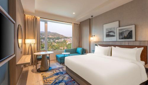 Deluxe Room with 15% discount on Food & Beverage , 20% discount on laundry and 2+1 offer on selected IMFL brands from 11am to 11pm and Evening Tea coffee session