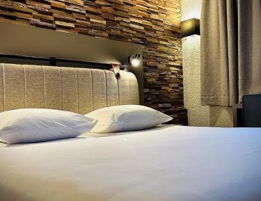 Standard Quadruple Room with One Double and Two Single Beds
