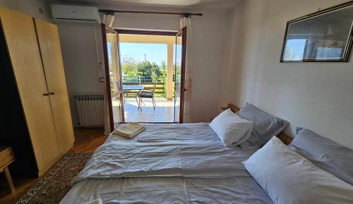 One-Bedroom Apartment with Balcony and Sea View