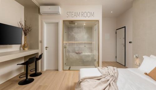 Ground Floor Suite with Private Steam Room and Private Yard