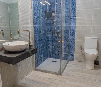 Quadruple Room with Private Bathroom