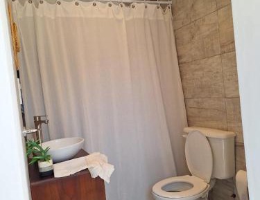 Deluxe One-Bedroom Apartment with Garden View