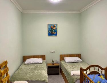 Deluxe Two-Bedroom Apartment with Garden View