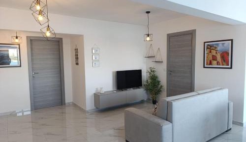 One-Bedroom Apartment with Balcony and Sea View