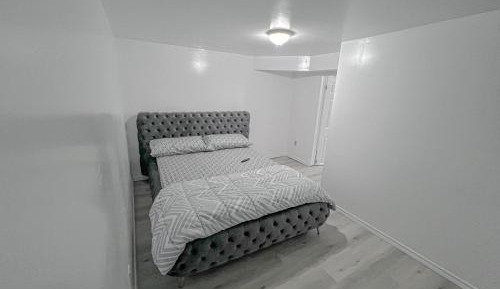 Queen Room with Shared Bathroom