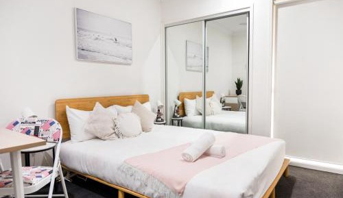 Queen Room with Shared Bathroom