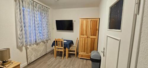 Single Room with Shared Shower and Toilet