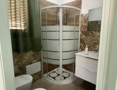 Quadruple Room with Private Bathroom