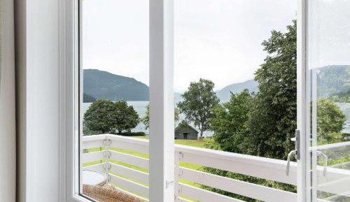 Junior King Suite with Sofa Bed, Balcony and Sea View