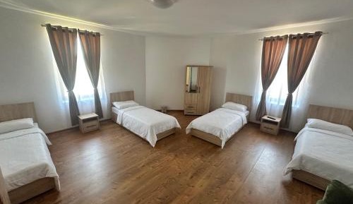 Quadruple Room with Shared Bathroom