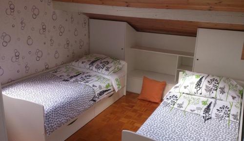 Single Bed in Dormitory Room