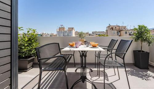 One-Bedroom Apartment with Balcony and City View