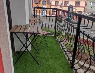 One-Bedroom Apartment with Balcony and City View