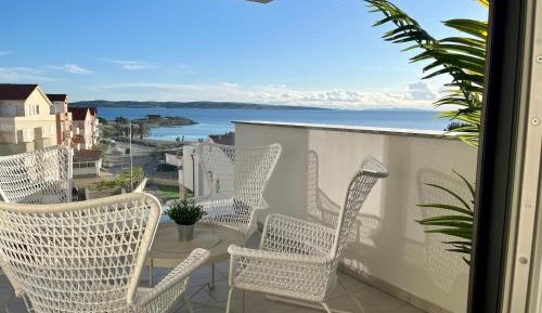 Three-Bedroom Apartment with Sea View
