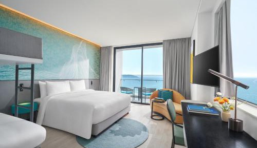 Family Balcony Seaview Room with One King and One Bunk Bed