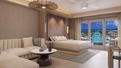 Deluxe King Room with Sofa Bed and Balcony - Oceanfront