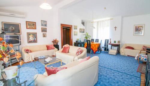 Four-Bedroom Apartment with Balcony and Sea View