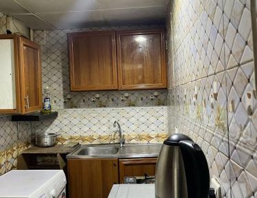 Queen Room with Shared Bathroom