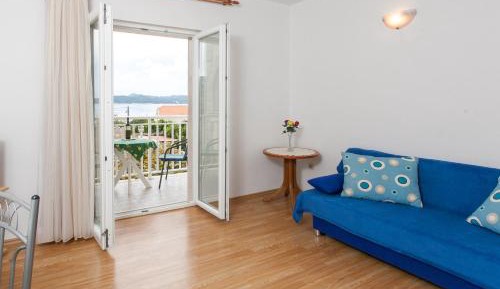 One-Bedroom Apartment with Balcony and Sea View