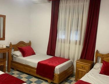 Basic Triple Room with Shared Bathroom