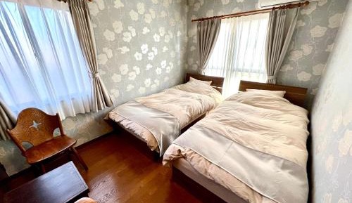 Twin Room with Shared Bathroom