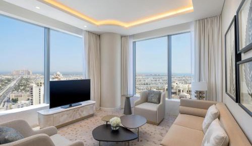 Grand Deluxe Suite with Sea View, KYMA beach access, Signature St. Regis Butler Service