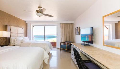 Queen Room with Two Queen Beds and Ocean View